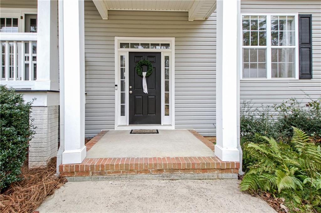 68 Skyview Road Senoia, GA 30276 - Photo 4 of 51 a front view of a house with a garage