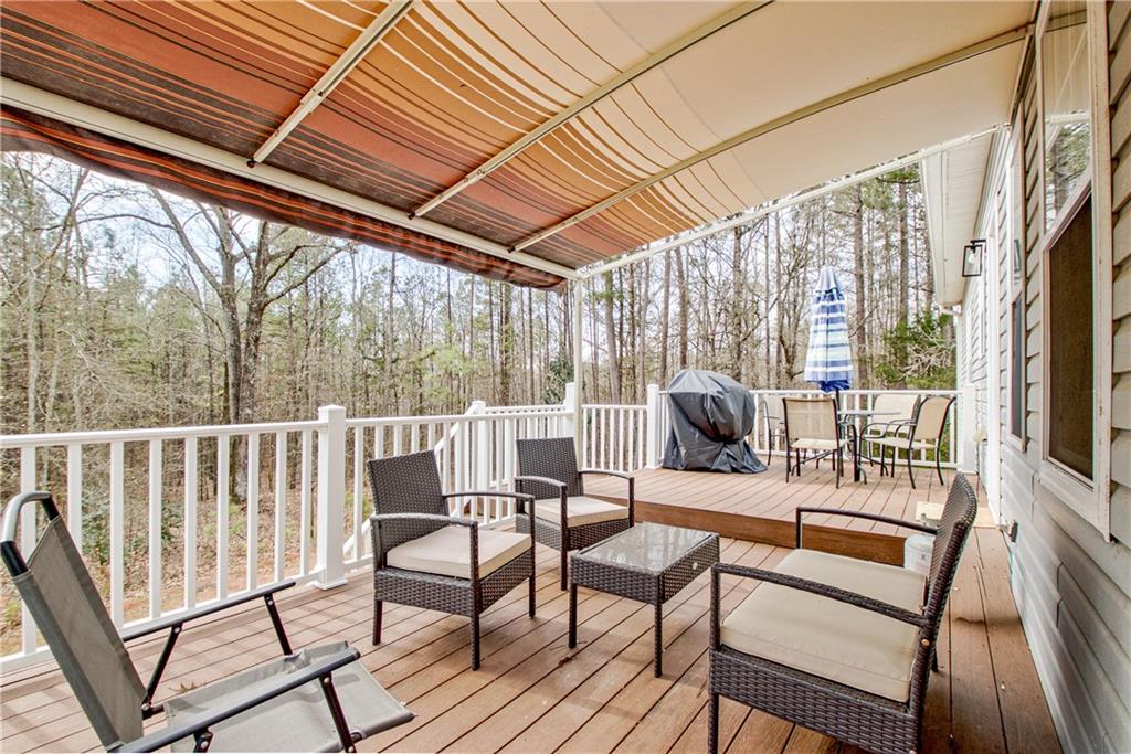 68 Skyview Road Senoia, GA 30276 - Photo 43 of 51 a view of living room with furniture and wooden floor