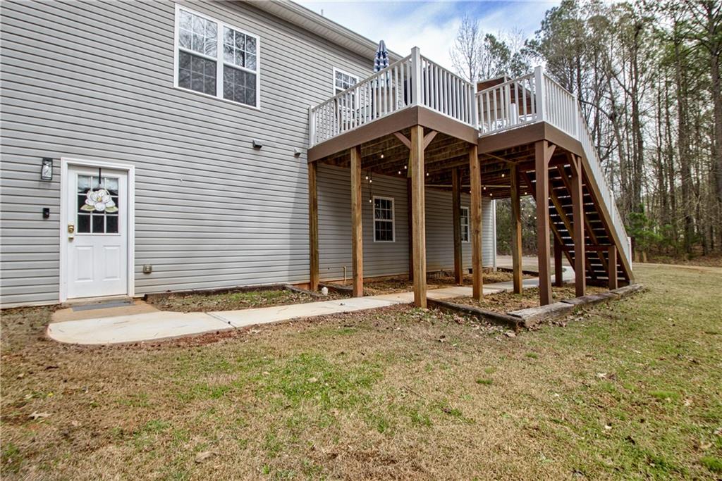 68 Skyview Road Senoia, GA 30276 - Photo 45 of 51 a view of a house with wooden floor and fence