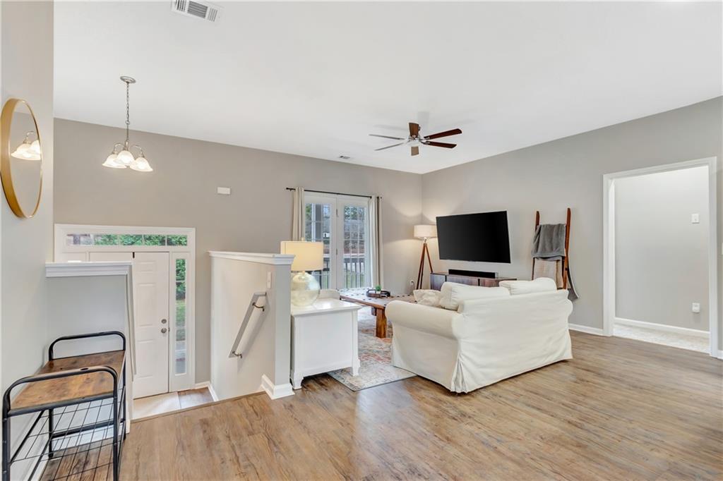 68 Skyview Road Senoia, GA 30276 - Photo 7 of 51 a living room with furniture and a flat screen tv