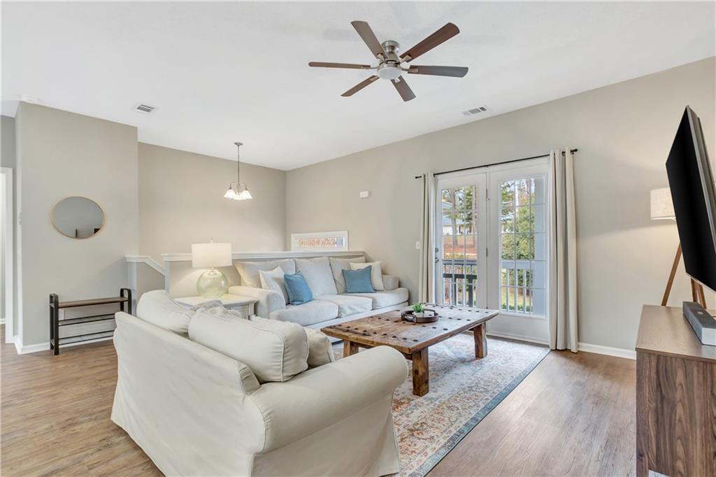 68 Skyview Road Senoia, GA 30276 - Photo 8 of 51 a living room with furniture and a large window