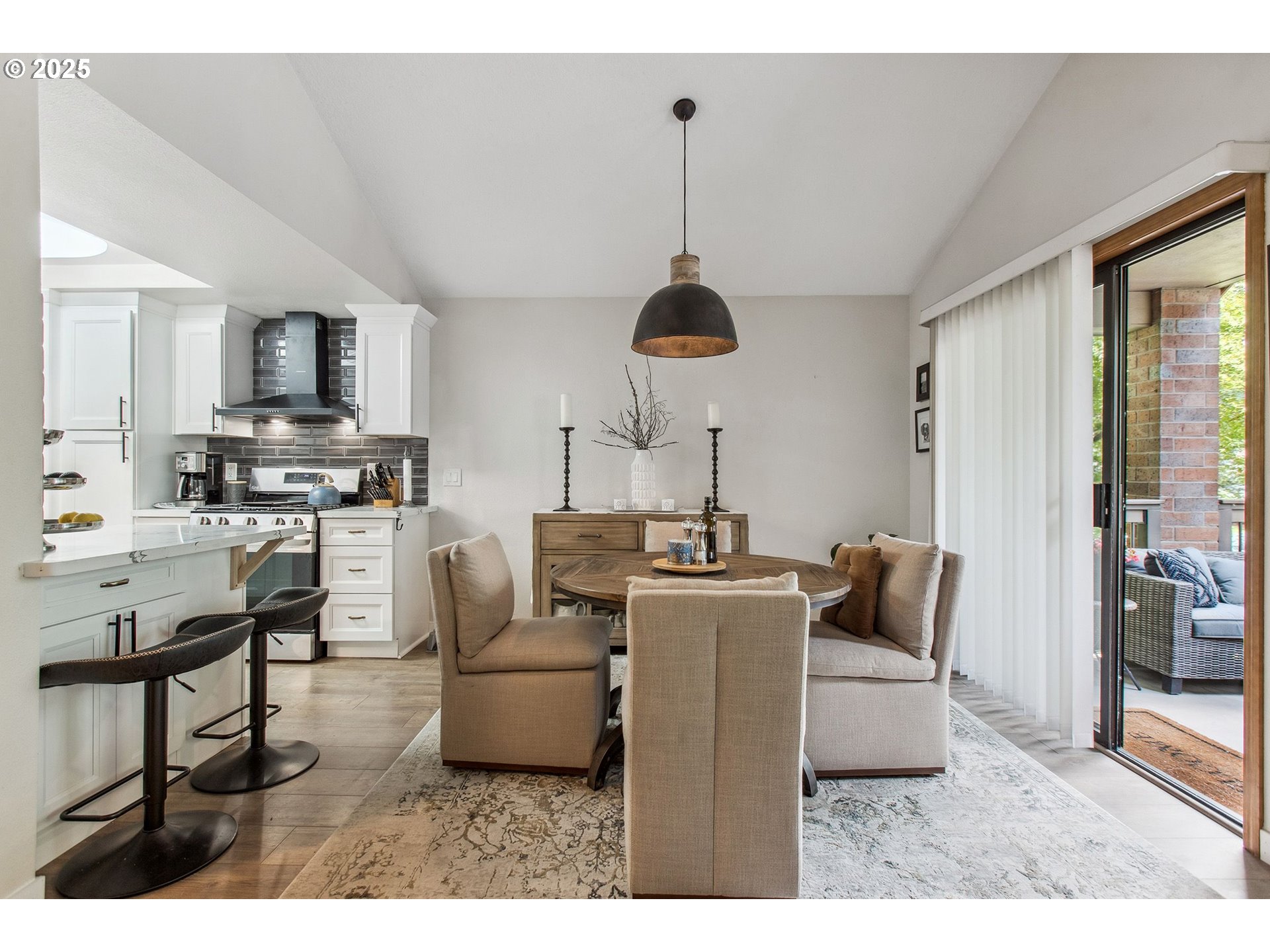 15565 Southwest 114th Court, Unit 26 Portland, OR 97224 - Photo 10 of 32 a living room with furniture and kitchen view