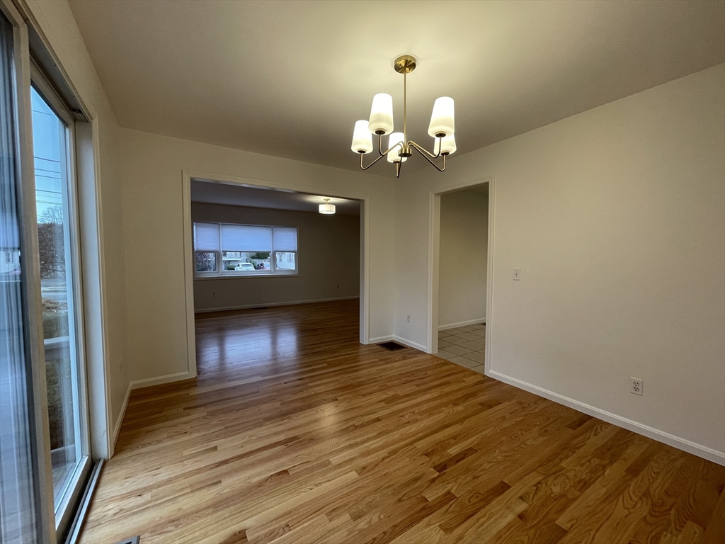 196 Linwood Avenue, Unit 196 Newton, MA 02460 - Photo 18 of 37 a view of empty room with wooden floor