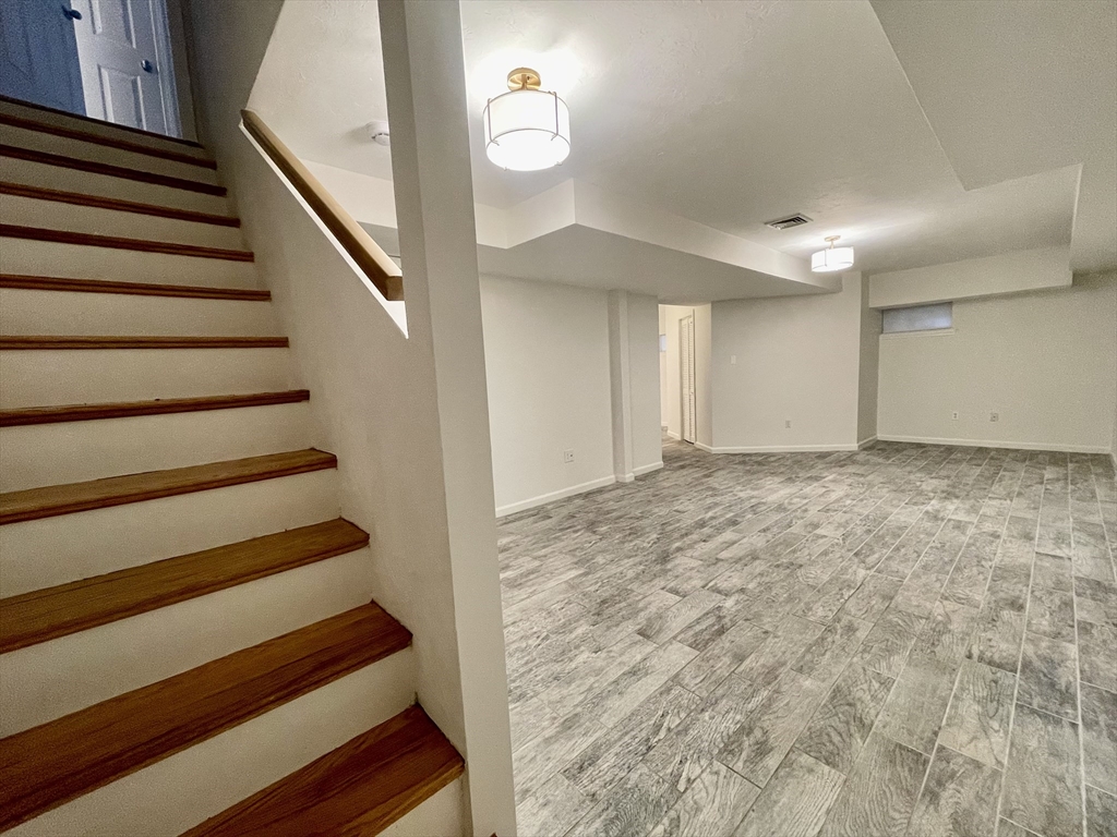 196 Linwood Avenue, Unit 196 Newton, MA 02460 - Photo 33 of 37 a view of entryway