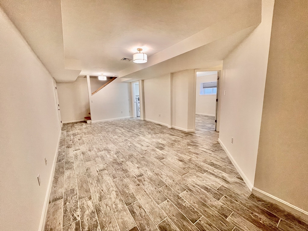 196 Linwood Avenue, Unit 196 Newton, MA 02460 - Photo 37 of 37 a view of a hallway