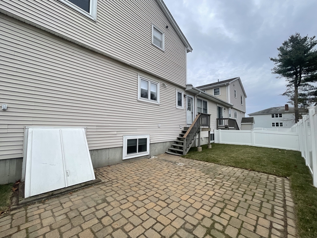 196 Linwood Avenue, Unit 196 Newton, MA 02460 - Photo 5 of 37 a front view of a house with a yard