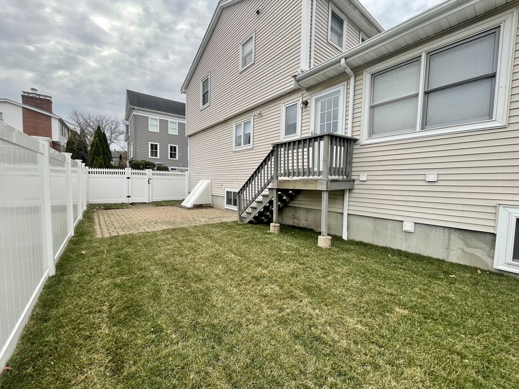 196 Linwood Avenue, Unit 196 Newton, MA 02460 - Photo 6 of 37 a view of a house with a yard