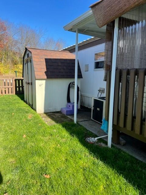 23 Reedsdale Drive Clairton, PA 15025 - Photo 15 of 17 a view of backyard with barbeque grill and wooden fence