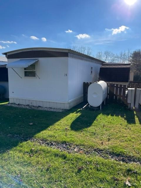 23 Reedsdale Drive Clairton, PA 15025 - Photo 16 of 17 a backyard of a house with table and chairs