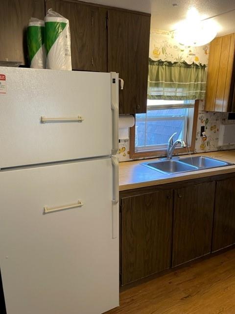 23 Reedsdale Drive Clairton, PA 15025 - Photo 6 of 17 a white refrigerator freezer sitting in a kitchen