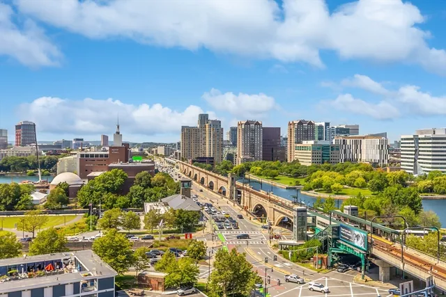 a view of a city with tall buildings