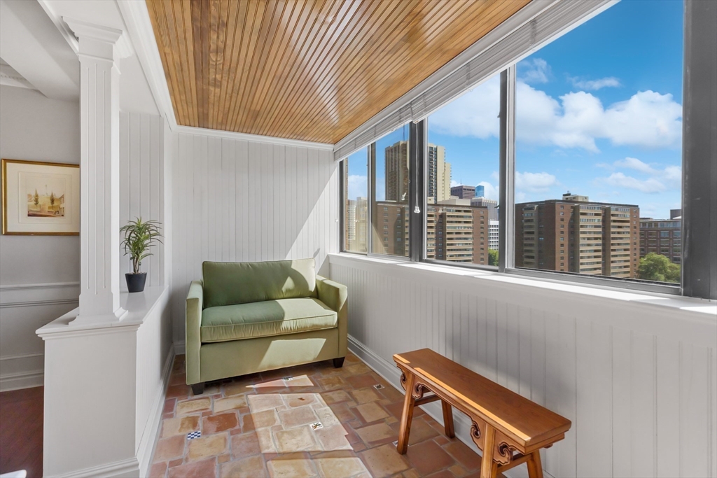 6 Whittier Place, Unit 14N&O Boston, MA 02114 - Photo 11 of 31 a living room with furniture and a window