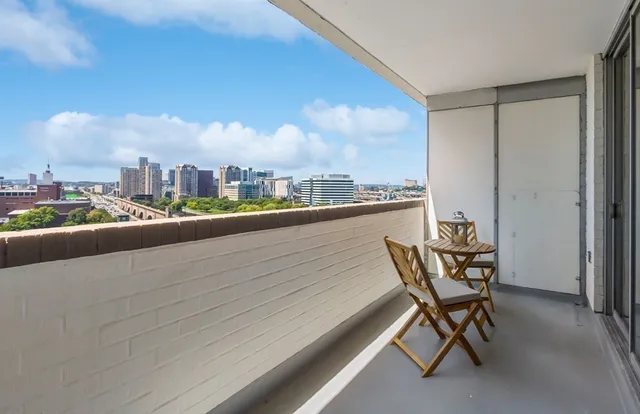 a view of a terrace with chairs