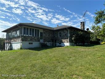 2324 Lake Minsi Drive Bangor, PA 18013 - Photo 2 of 20 a front view of a house with a yard