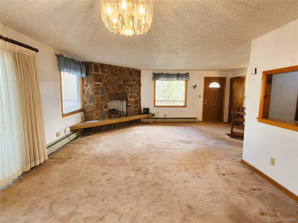 a view of a street with cars