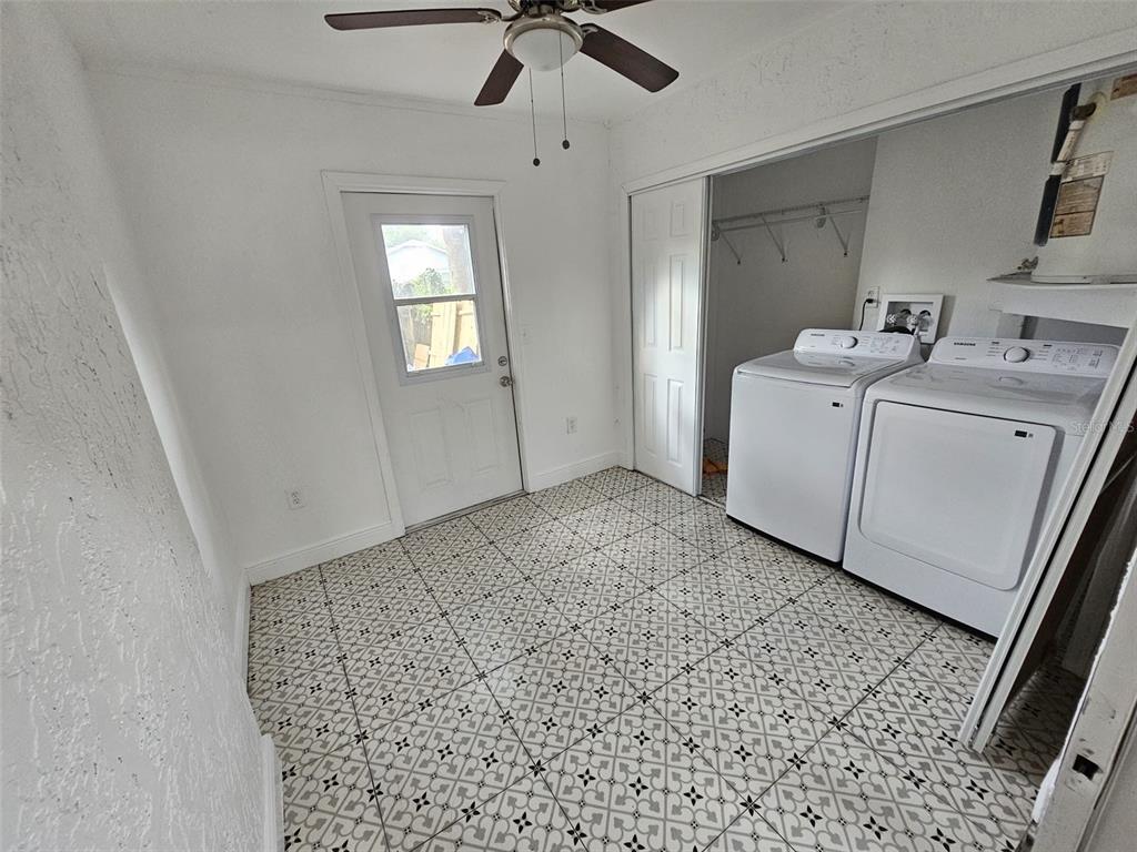 10481 Riva Ridge Trail Orlando, FL 32817 - Photo 5 of 9 a bathroom with a sink a toilet and shower