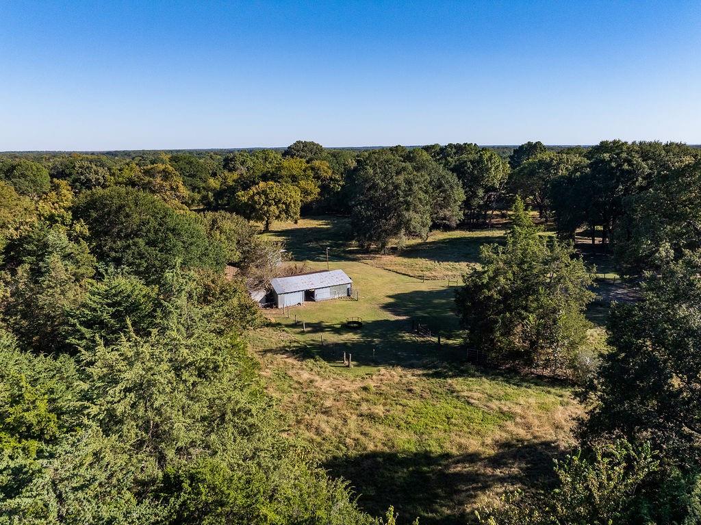 213 County Road 2320 Telephone, TX 75488 - Photo 21 of 40 a view of a lake with a mountain