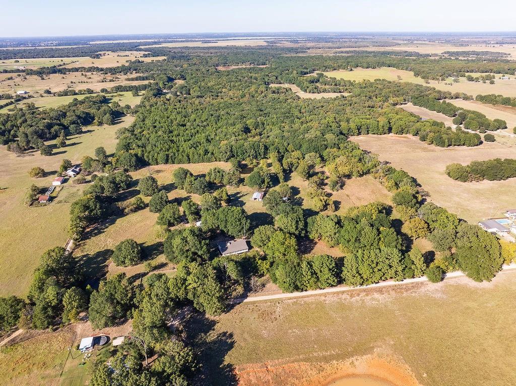 213 County Road 2320 Telephone, TX 75488 - Photo 25 of 40 a view of a city with an ocean
