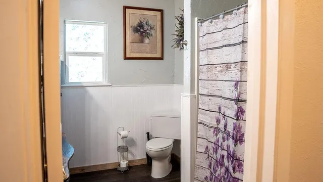 a view of livingroom with washer and dryer