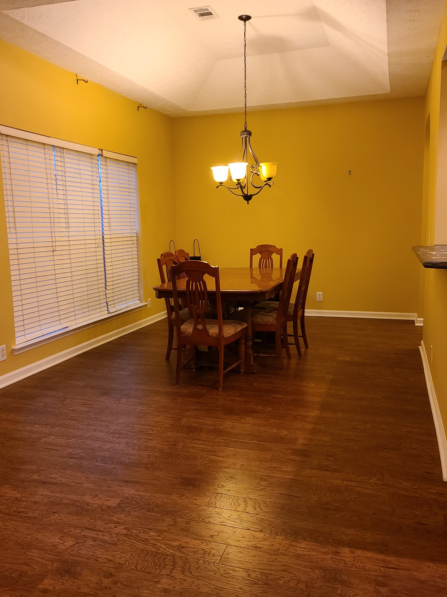 728 Canoe Ridge Point Antioch, TN 37013 - Photo 16 of 40 a view of a dining room with furniture wooden floor and chandelier