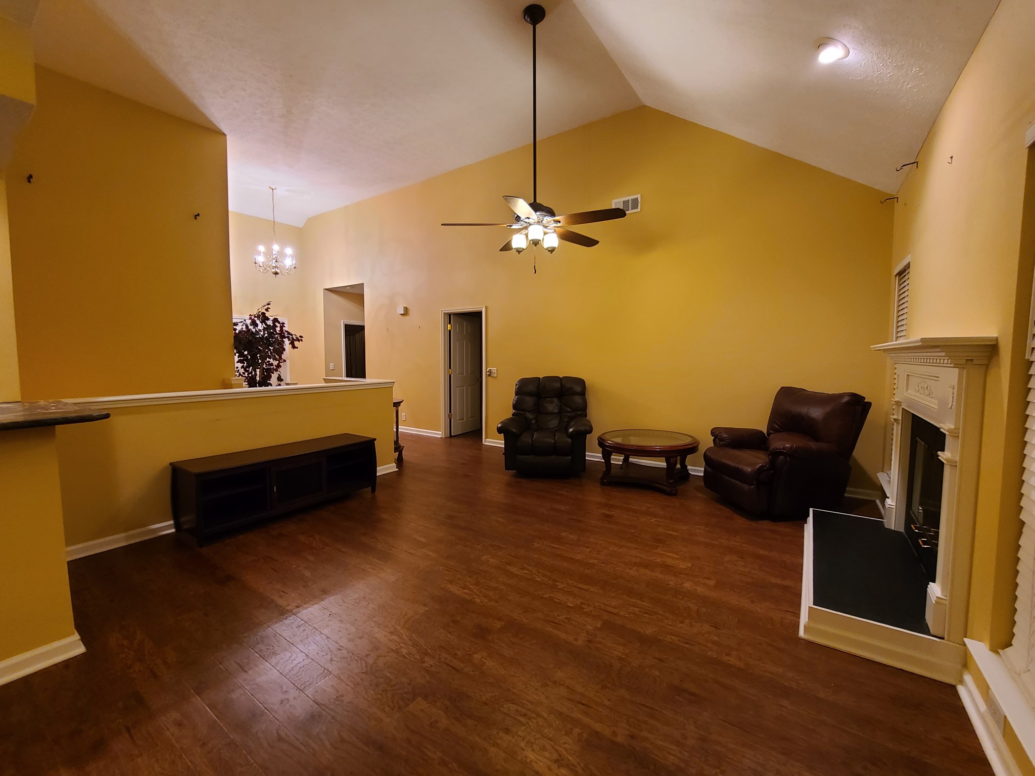 728 Canoe Ridge Point Antioch, TN 37013 - Photo 17 of 40 a bedroom with furniture and a wooden floor