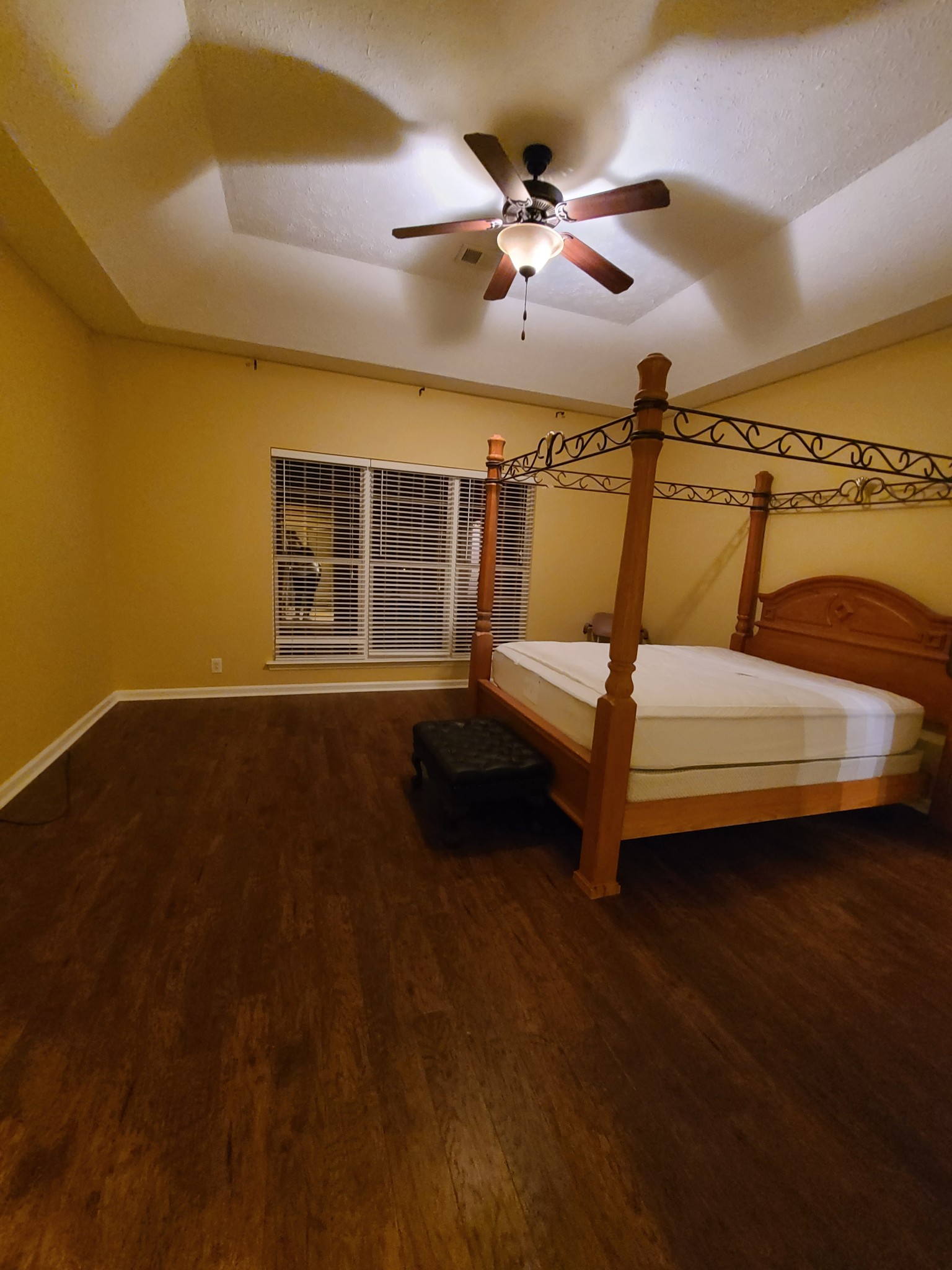 728 Canoe Ridge Point Antioch, TN 37013 - Photo 19 of 40 a bedroom with a bed and lamp