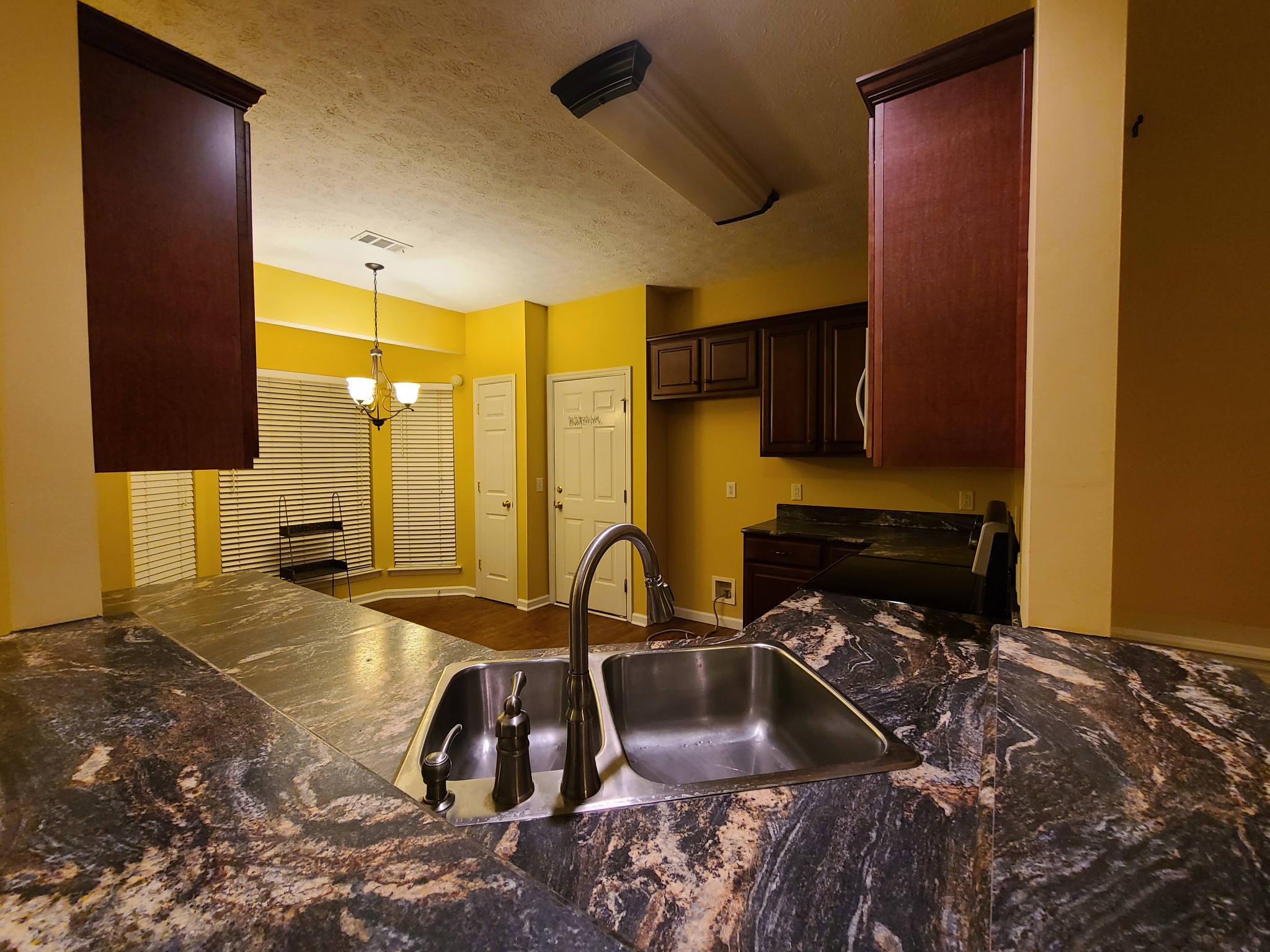 728 Canoe Ridge Point Antioch, TN 37013 - Photo 6 of 40 a bathroom with a sink and a mirror