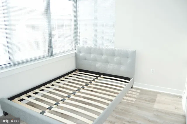 a view of wooden floor in a living room