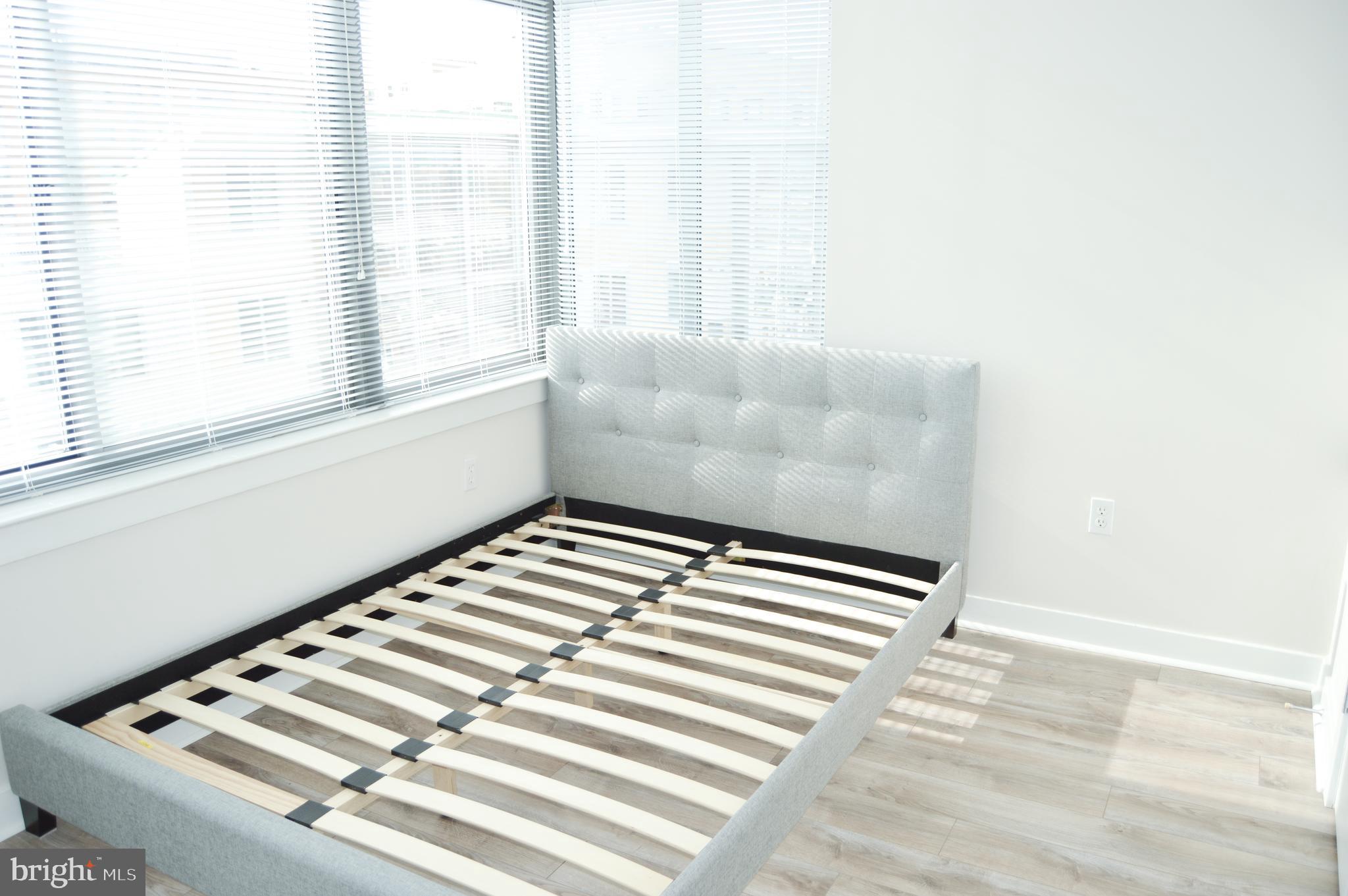 460 New York Avenue Northwest, Unit 805 Washington, DC 20001 - Photo 12 of 21 a view of wooden floor in a living room
