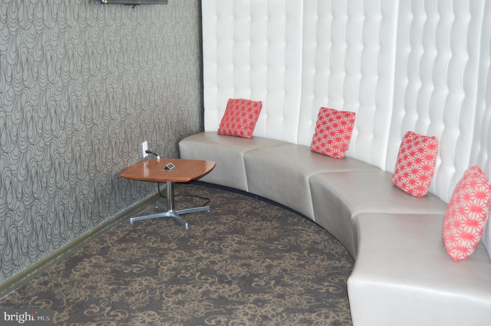 460 New York Avenue Northwest, Unit 805 Washington, DC 20001 - Photo 21 of 21 a living room with furniture and a couch