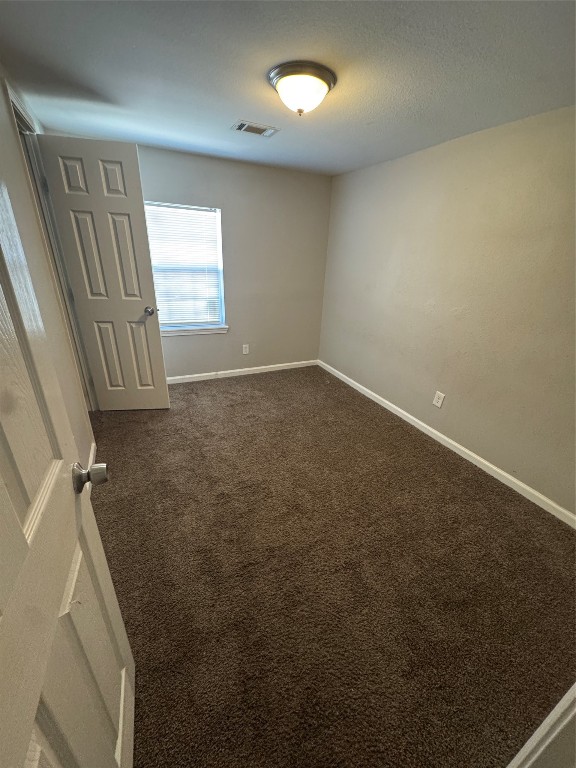 8502 North Main Street Houston, TX 77022 - Photo 8 of 13 an empty room with windows