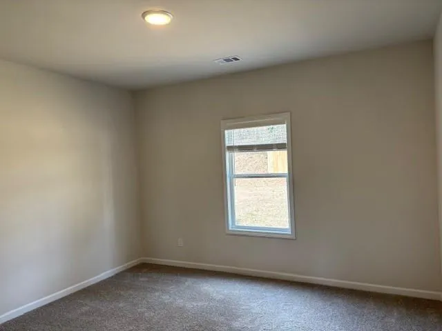 a bathroom with a granite countertop bathtub toilet and sink