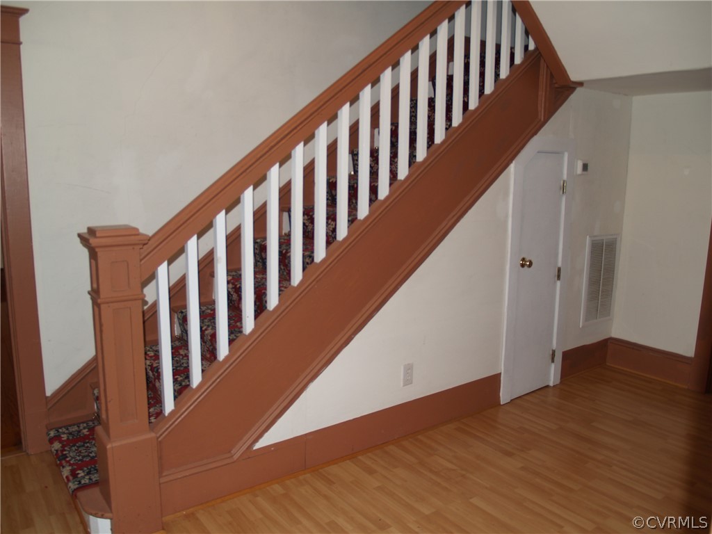 7988 Richmond Road Toano, VA 23168 - Photo 13 of 25 Stairway in entrance foyer.
