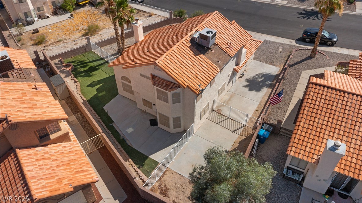 3156 Terrace View Drive Laughlin, NV 89029 - Photo 79 of 94 An aerial perspective reveals a private yard with paved areas, fencing, and mature landscaping.