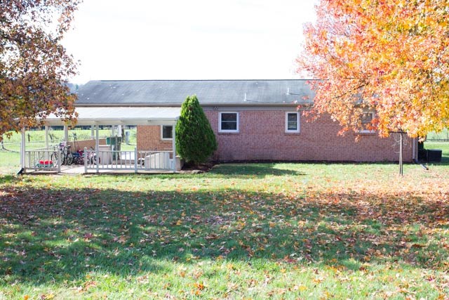 7386 Spring Creek Road Bridgewater, VA 22812 - Photo 19 of 23 a view of house with yard