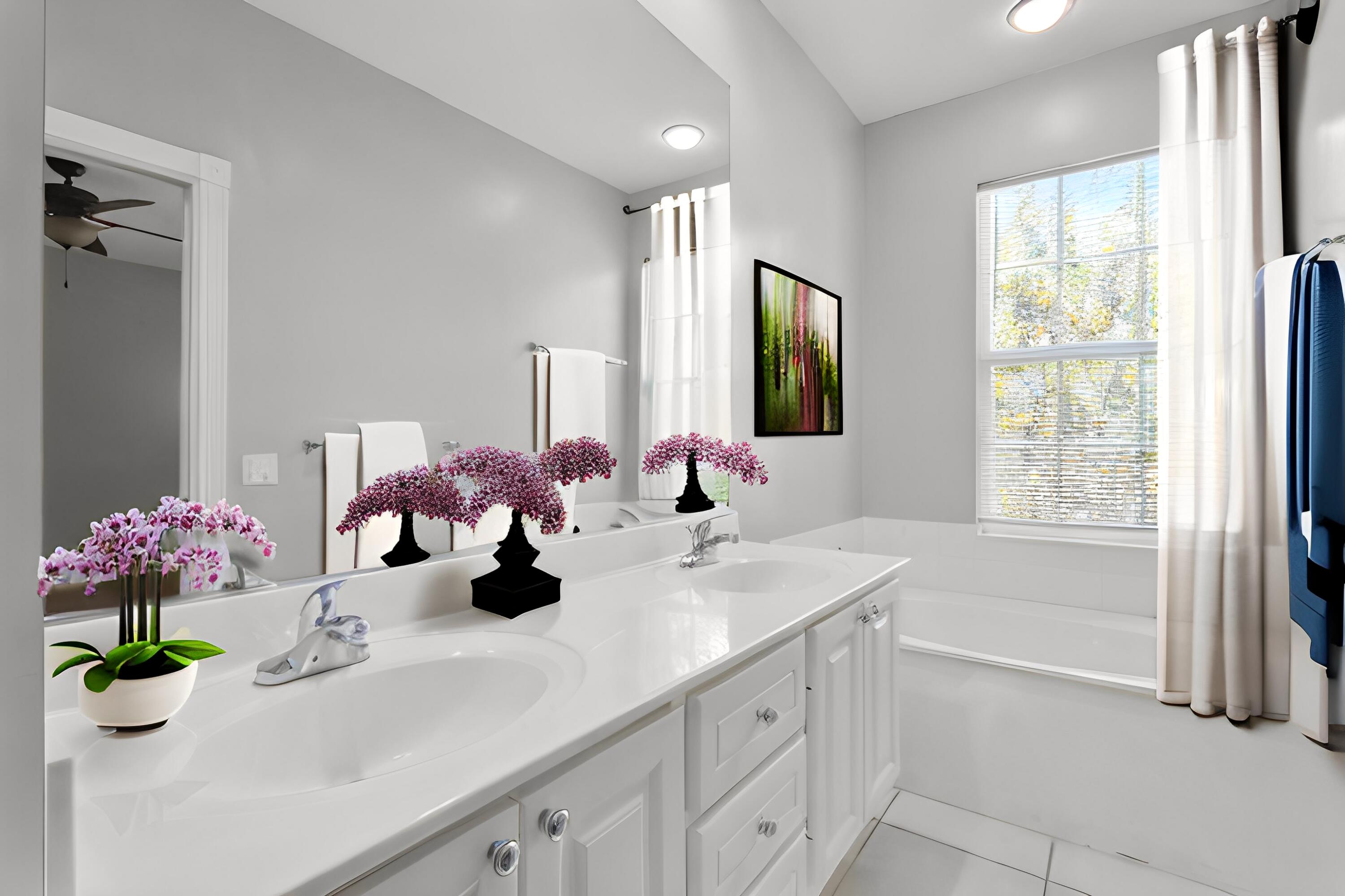 155 Waterford Drive Jupiter, FL 33458 - Photo 27 of 51 a bathroom with a sink a vanity and a mirror