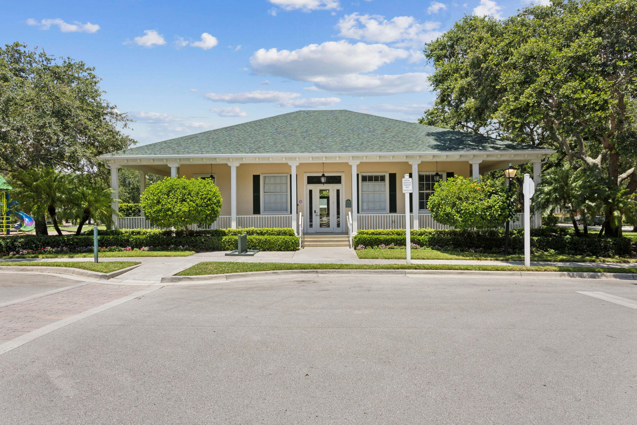 155 Waterford Drive Jupiter, FL 33458 - Photo 47 of 51 a view of a house with a big yard and large trees