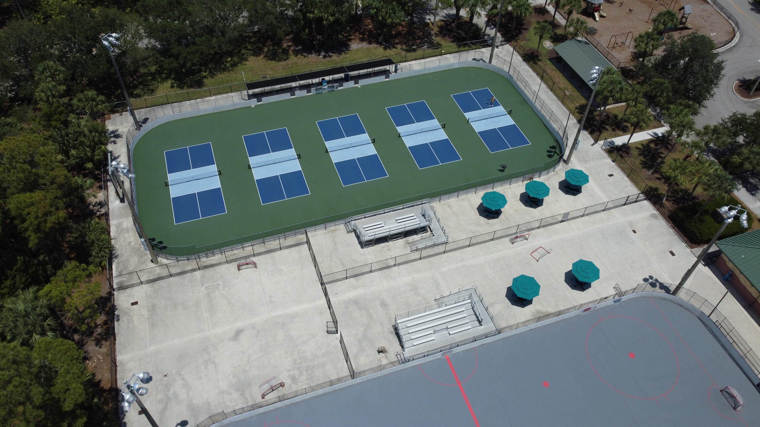 155 Waterford Drive Jupiter, FL 33458 - Photo 50 of 51 a front view of a house with lots of trees