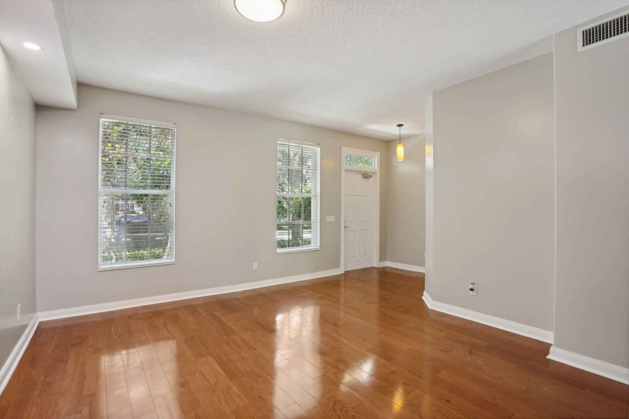 155 Waterford Drive Jupiter, FL 33458 - Photo 7 of 51 a view of an empty room with a window