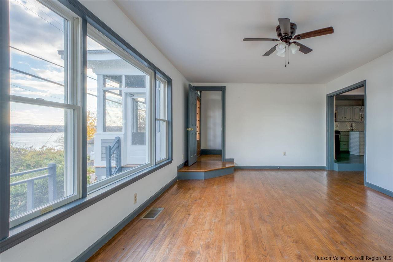 94 River Road Ulster Park, NY 12487 - Photo 15 of 31 a view of empty room with wooden floor and fan