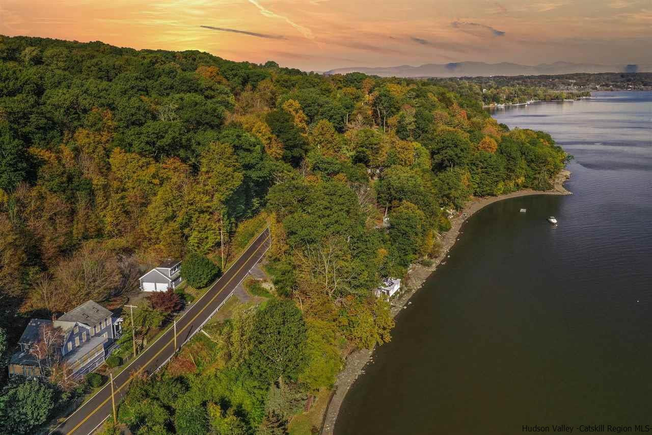 94 River Road Ulster Park, NY 12487 - Photo 2 of 31 a view of a lake with a mountain