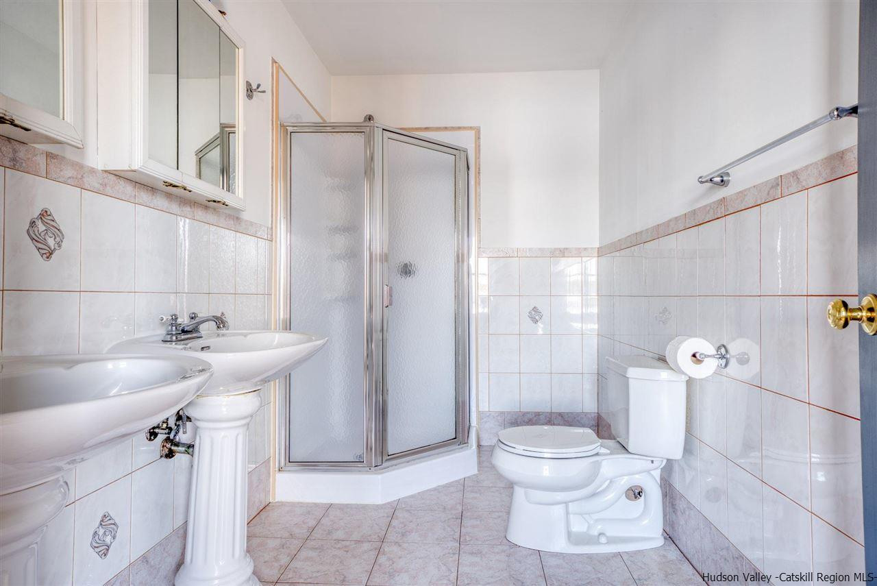 94 River Road Ulster Park, NY 12487 - Photo 23 of 31 a bathroom with a sink toilet and shower