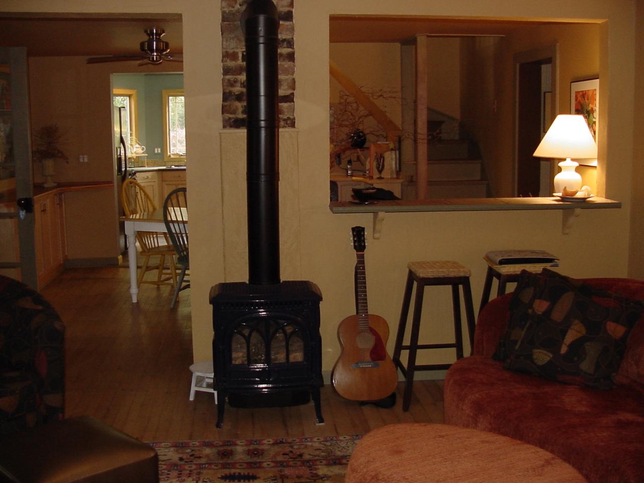 428 Sowers Mill Dam Road Northeast Riner, VA 24149 - Photo 19 of 31 a living room with furniture and a lamp