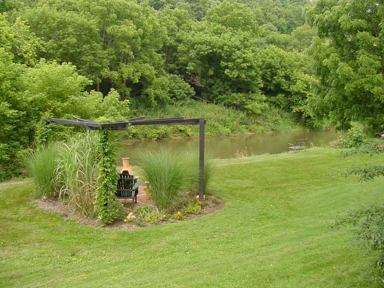 428 Sowers Mill Dam Road Northeast Riner, VA 24149 - Photo 5 of 31 a view of a lake from a yard