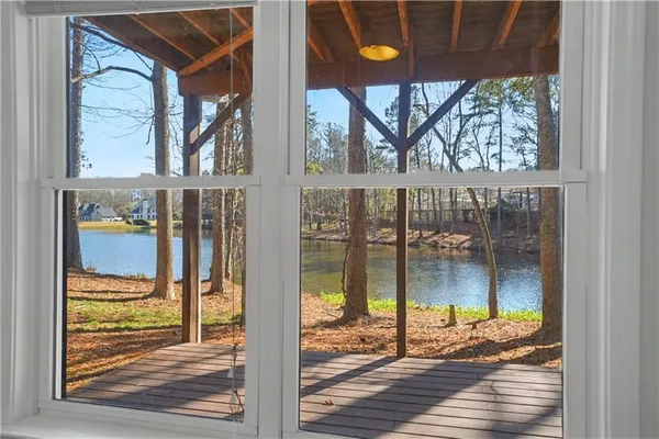 a view of a porch with a door and balcony