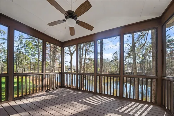 a view of a balcony with wooden floor