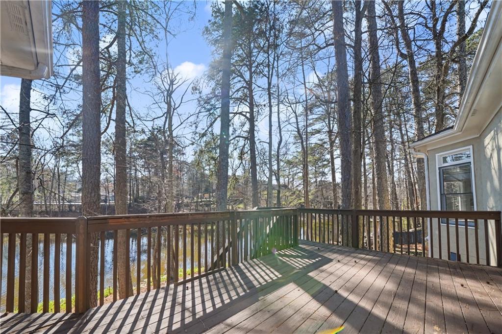 195 Brightmore Way Alpharetta, GA 30005 - Photo 27 of 30 a view of a wooden roof deck