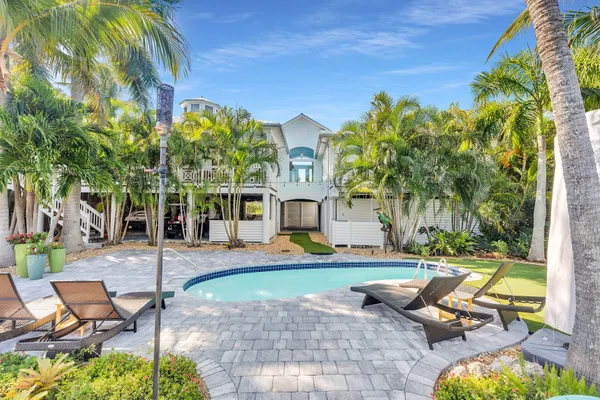 a view of front door with wooden floor