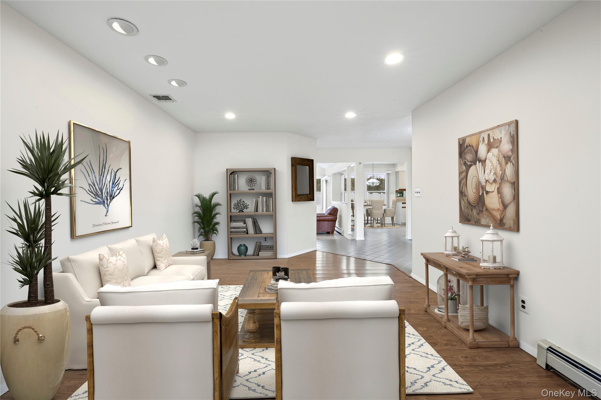 6 Hillview Court Commack, NY 11725 - Photo 11 of 43 a living room with furniture and a table