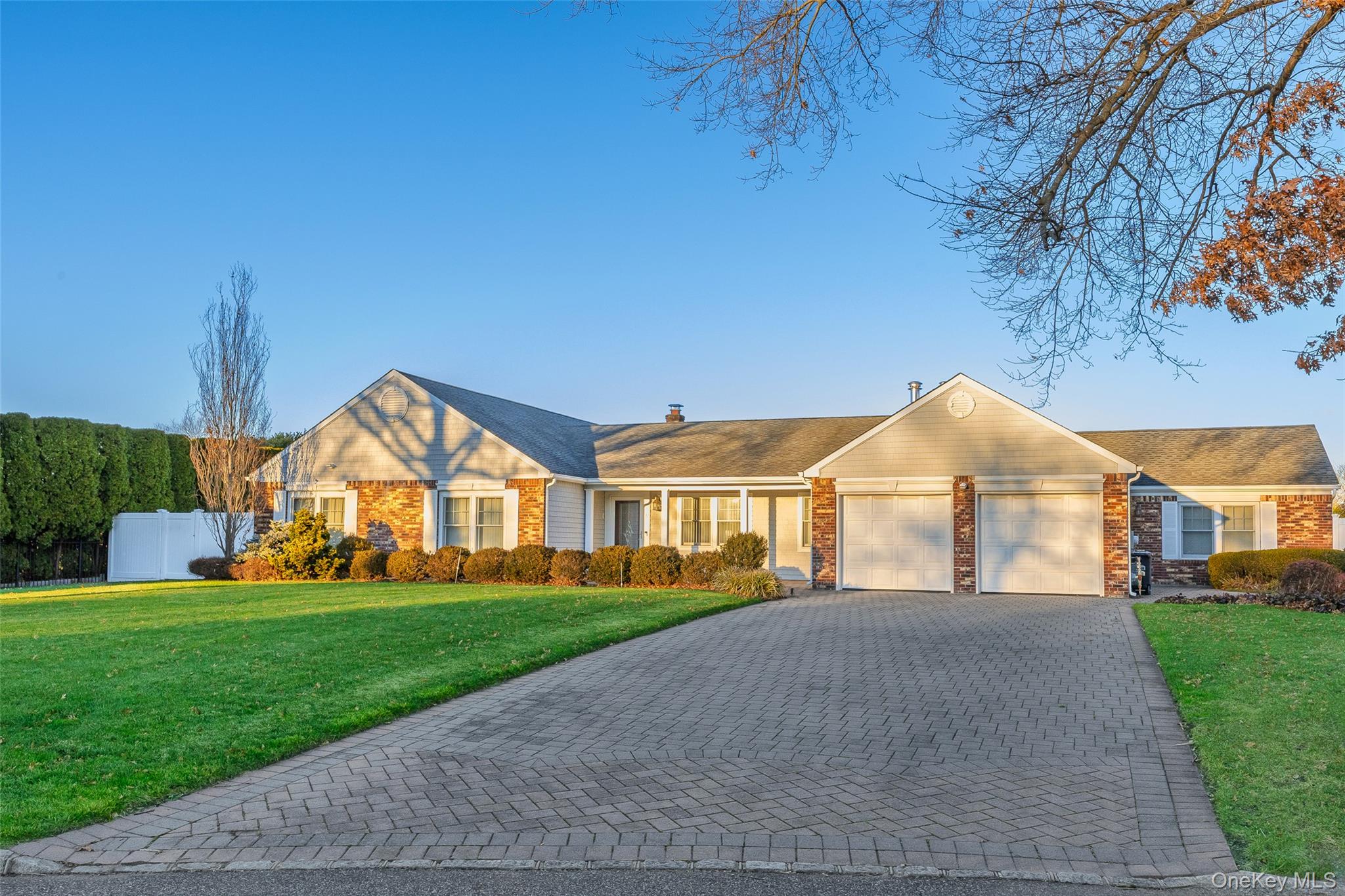 6 Hillview Court Commack, NY 11725 - Photo 2 of 43 a front view of a house with a yard